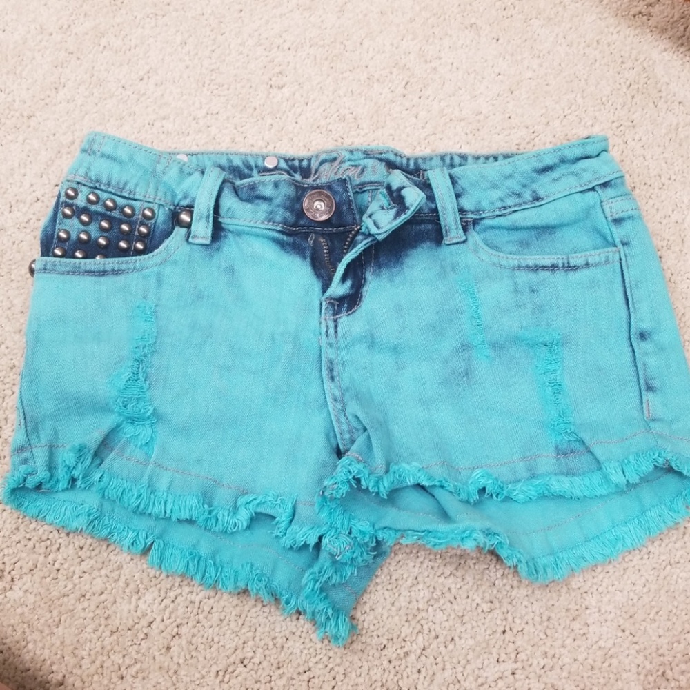 Blue shorts with studs